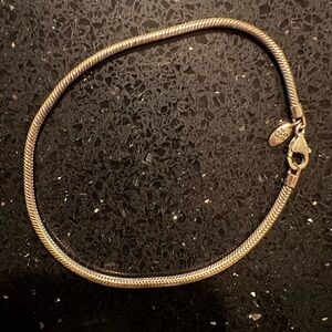 Silver tennis bracelet, 8in